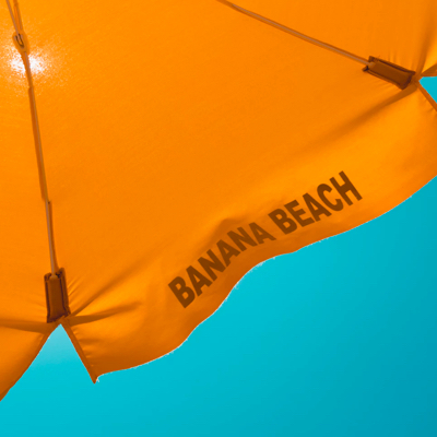 Orange umbrella from below